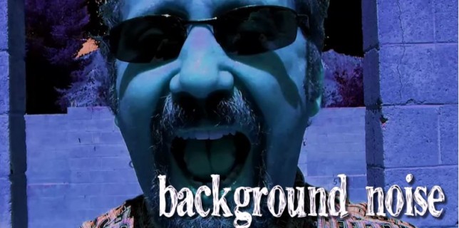 Blue-tinted image of man's face yelling into camera with words Background Noise